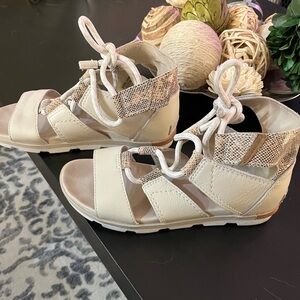 Sorel white sandals.